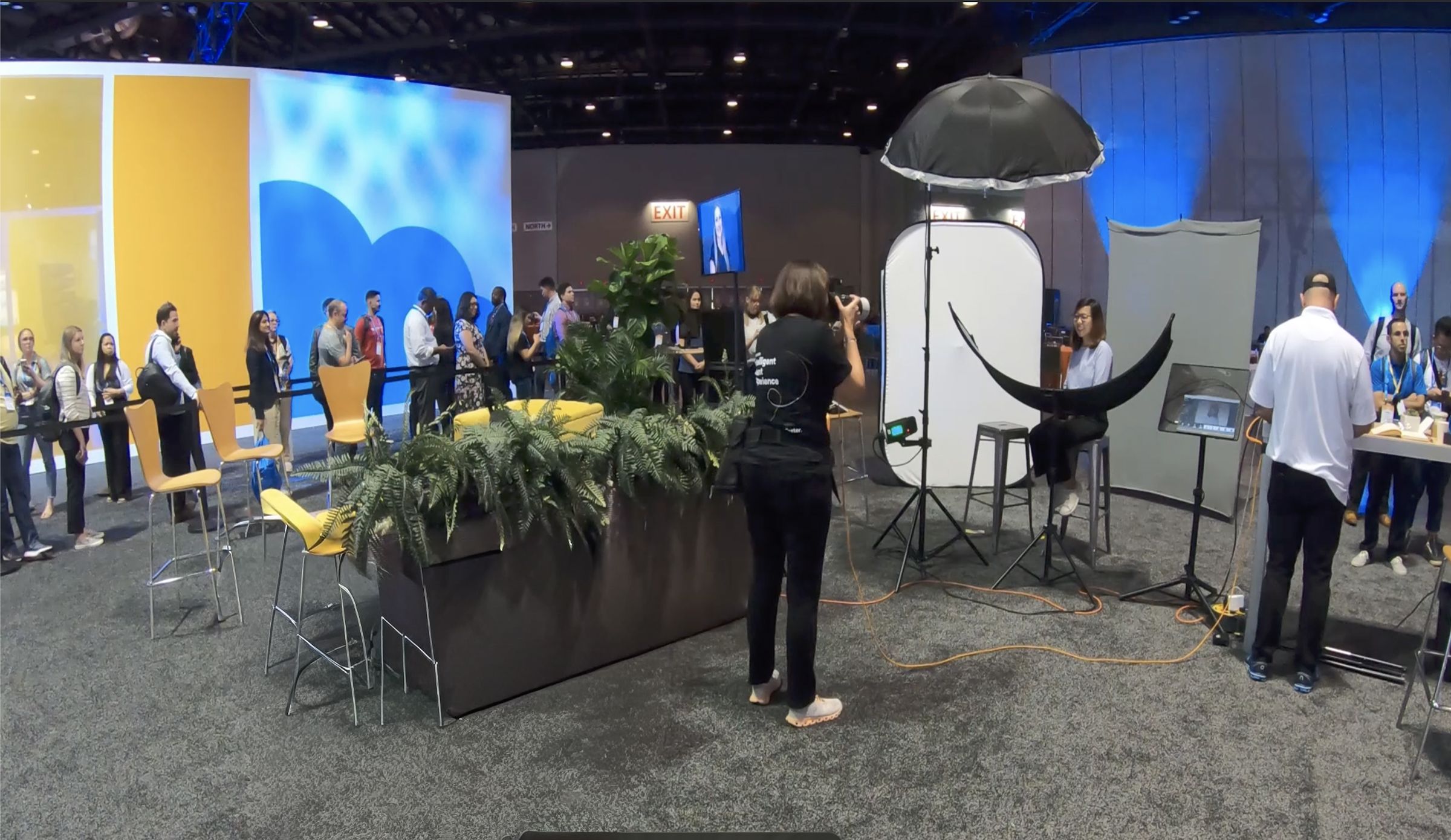 Corporate event photographer providing a trade show headshot experience