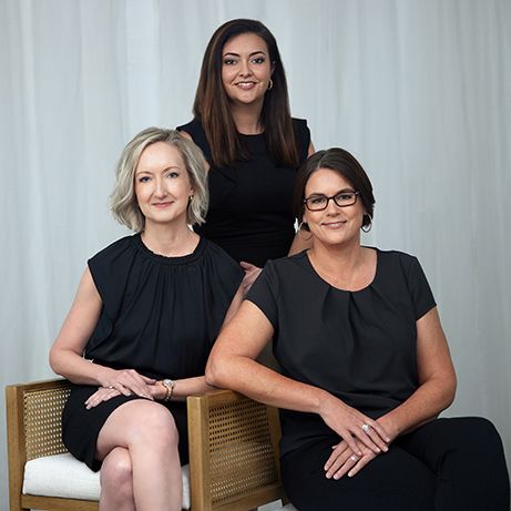 Three-woman professional team business portrait